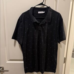 Calvin Klein Men's Polo Shirt in Black with Subtle Pattern